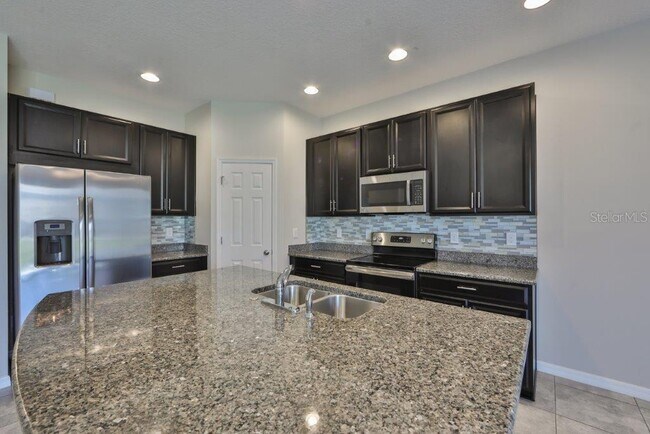 Foto del edificio - 7045 Grand Elm Dr