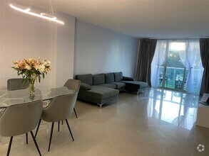 Building Photo - 19390 Collins Ave