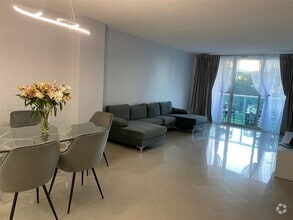 Building Photo - 19390 Collins Ave