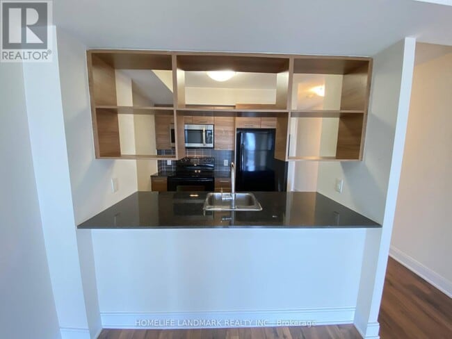 Building Photo - 135 Village Green Square