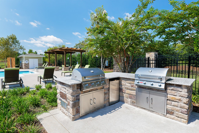 Charcoal grills and picnic areas throughout - Glenbrook Apartments