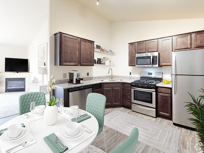 Kitchen with Stainless Steel Appliances - Bloomfield Townhomes