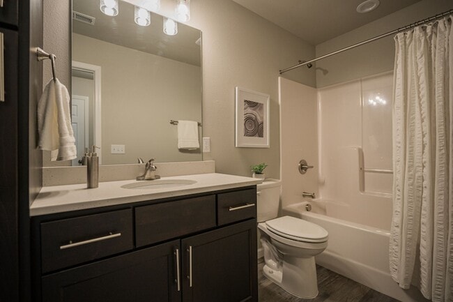 Building Photo - Quiet location - Check. Open floorplan - Check. 3-stall heated garage - Check. Welcome Home!