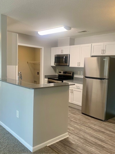 Building Photo - Charleston Place Apartment Homes