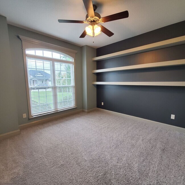 Building Photo - Elegant 4-Bedroom Home with Luxurious Feat...