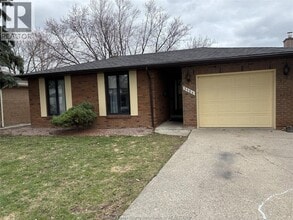 Building Photo - 3154 Regis Ave