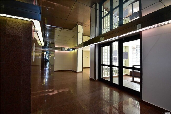 Building Photo - 94-31-94-59 59th Ave
