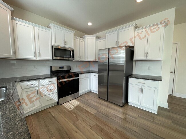 Building Photo - Great news! Application fee will be credit...