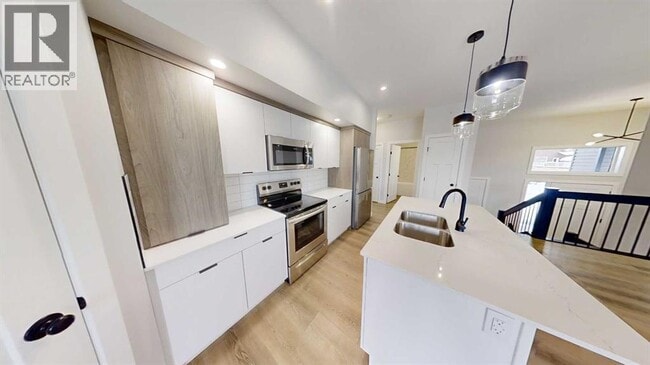 Building Photo - 10669-10133 133 Ave.