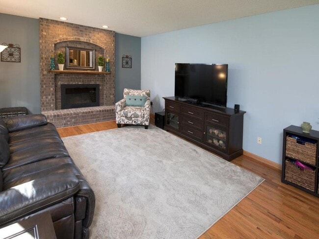 Building Photo - Elegant 2-Story has 4 BRs on Upper Level, Office, 2 Family Rooms, Fireplace & More!