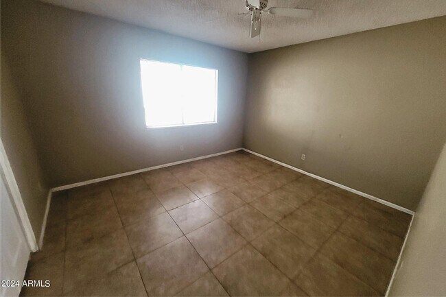 Building Photo - 6440 E Alder Ave