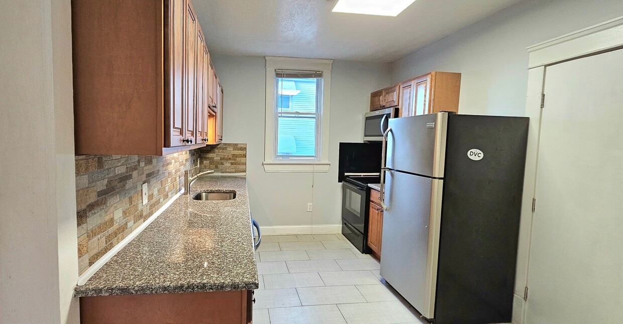 Foto principal - 1345 W 65th St