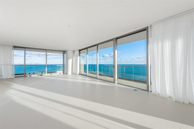 Building Photo - 10201 Collins Ave