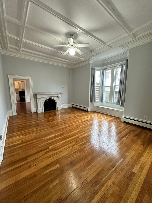 The bedroom has a huge sit-in bay window with built-in storage bench. Fireplace is aesthetic only. - 7 Maple Ave