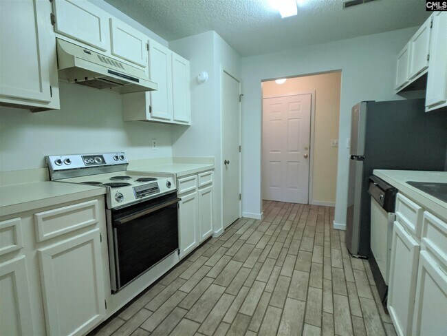 Foto del edificio - 5004 Village Creek Dr