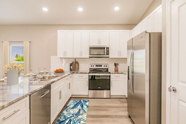 Building Photo - New construction home offering 4 bedrooms ...