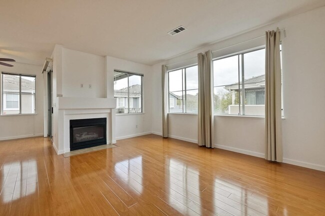 Living room (ample natural lighting) - 24 Crystal Ct