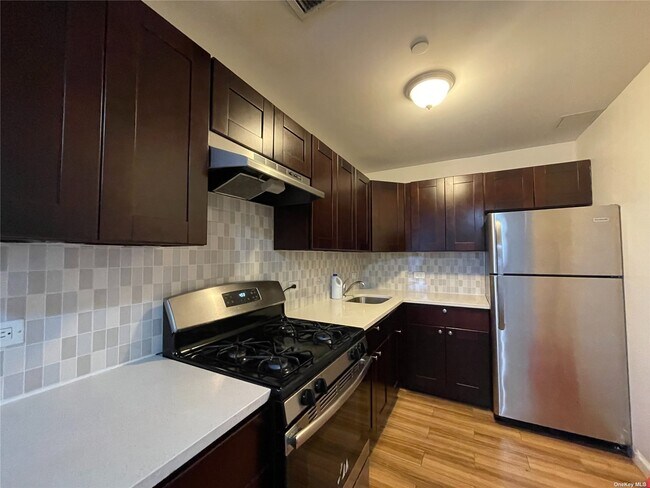 Building Photo - 8106 Dongan Ave