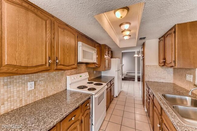 Foto del edificio - 4 br, 2.5 bath House - 3305 Castle Drive UNIT