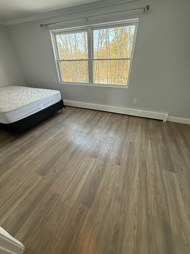 Building Photo - A two bedroom, 1 and a half bath unit in Townhouse. Unit 11-$2,800 per month plus utilities