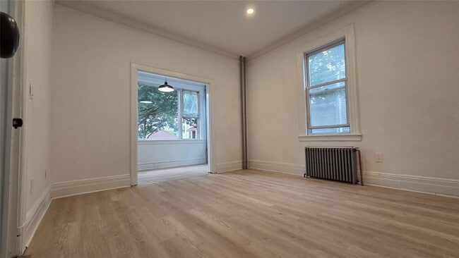 Building Photo - 42-21 65th Pl