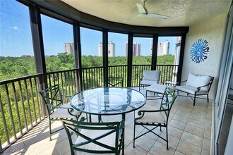 Building Photo - 8990 Bay Colony Dr