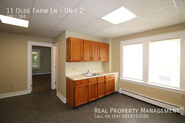 Building Photo - First Floor 2 Bedroom + Office with Heat I...