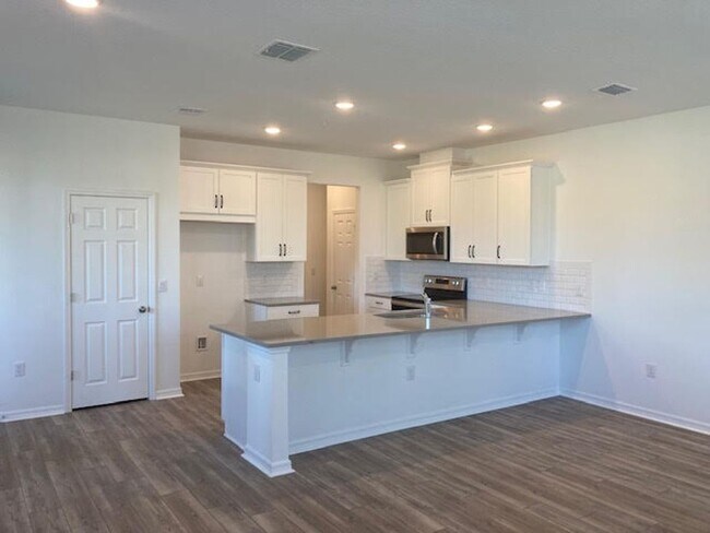 Foto del edificio - Immaculate 3/2.5 townhouse in Randal Walk Community of Lake Nona Area (Gated)