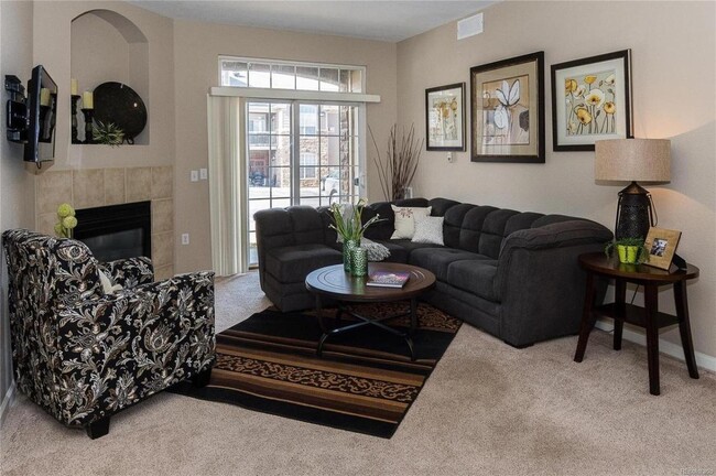 Living Room w/ Fireplace - 7440 S Blackhawk St