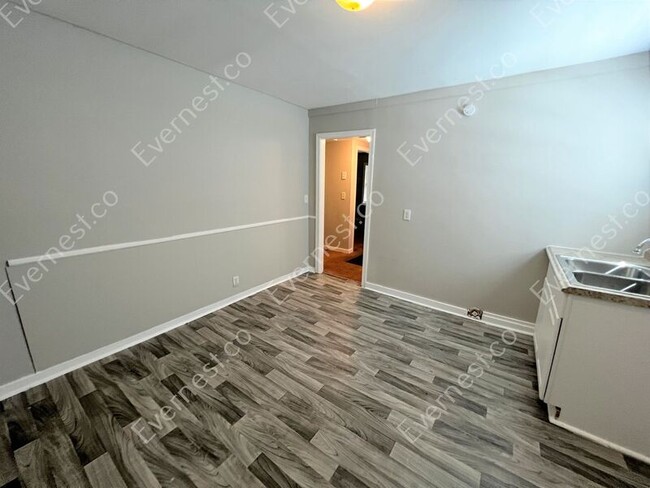 Building Photo - 8216 Rugby Ave