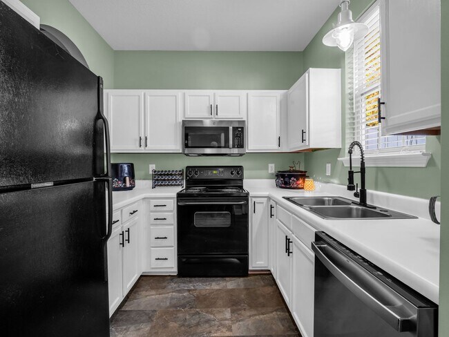 Foto del edificio - Cute- two bedroom townhome