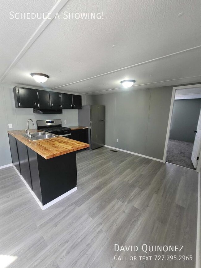 Building Photo - Sale Prices Starting at: $31,999 or Lease ...