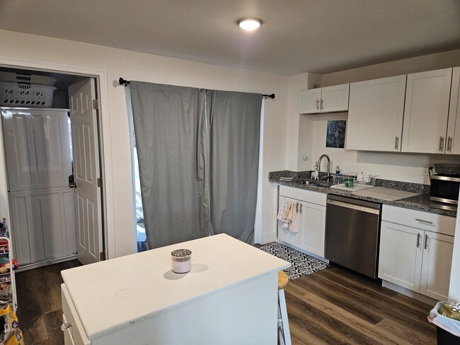Dishwasher! Exit to a covered patio. - 149 W Sheridan Ave