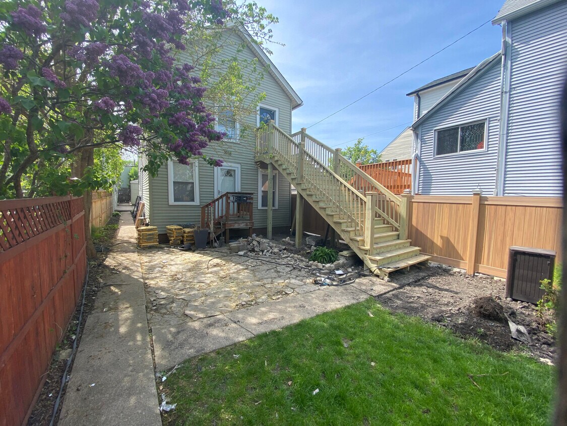 New stairs leading up to front of house - 1916 N Sawyer Ave
