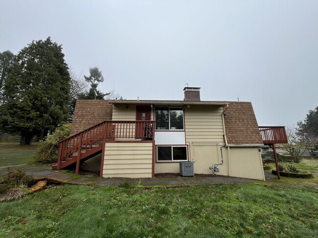 Building Photo - Beautiful Multi-Level Home with Vaulted Ceilings & Stunning Wood Accents