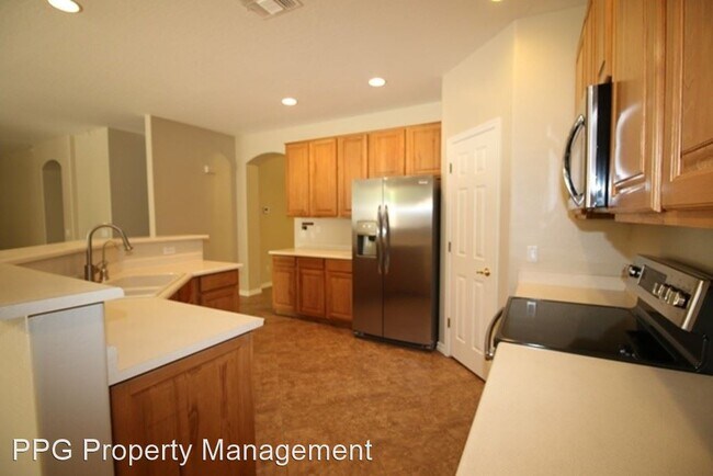 Building Photo - 5 br, 3 bath House - 13633 W Alvarado Dr