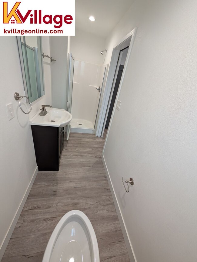 Building Photo - Co-living bedroom + bathroom, shared kitch...