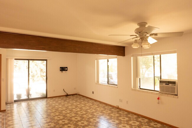 Sliding doors off living room provide access to front garden and parking area - 3319 Old Topanga Canyon Rd