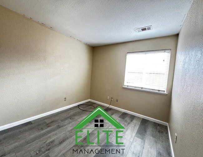 Building Photo - **Spacious 3-Bedroom Condo with 2-Car Gara...