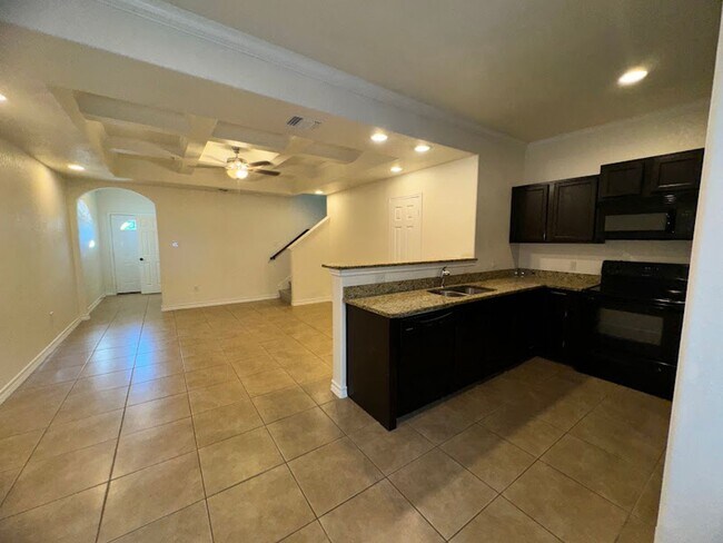 Building Photo - Convenient location, no carpet, fresh pain...