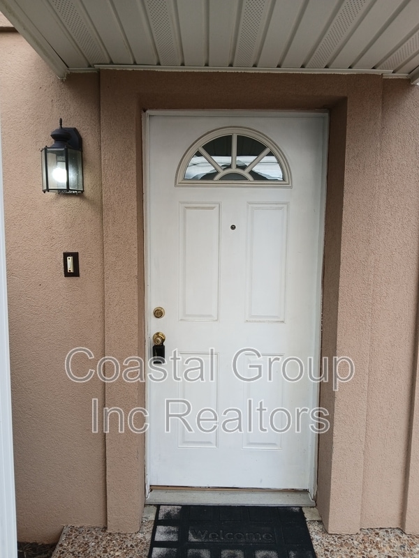Building Photo - 8550 Tidewater Dr