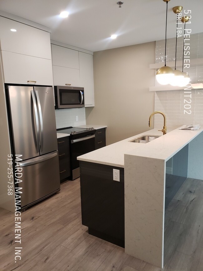 Building Photo - The Hive on Pelissier