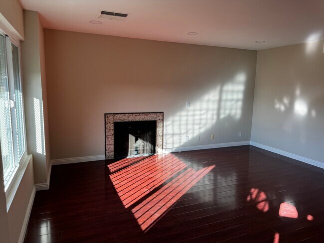 Living room with brand new windows and recessed lighting - 1634 Alegro Sq