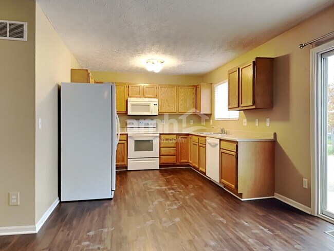 Foto del edificio - 8888 Woolstone Ct
