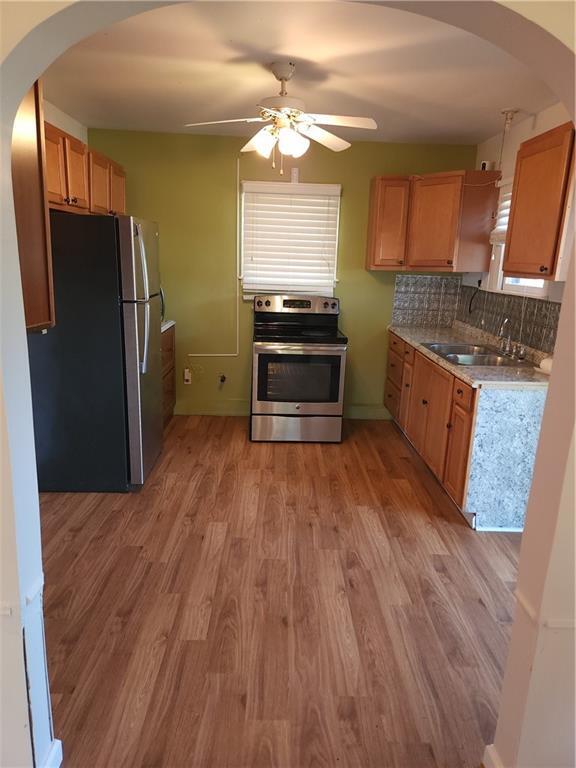 Foto del edificio - 6148 E 11th St