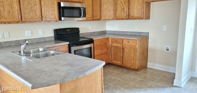 Building Photo - 718 Cobblestone Dr