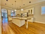 Kitchen island w/ cooktop on island. - 2330 Camden Dr