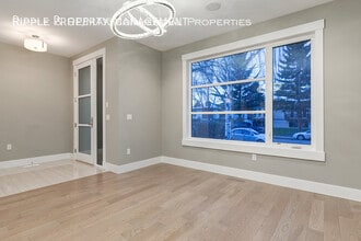 Building Photo - 2117-2151 51 Ave SW