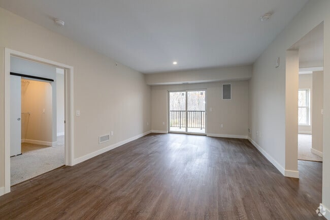 3BR, 2BA - 1,351SF - Living Room - Brightdawn Village Apartments