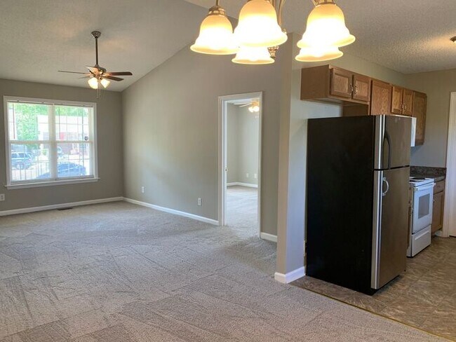 Building Photo - NE Brick Home, Vaulted Ceilings, Front Por...